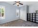 Spacious bedroom featuring shuttered windows, and carpeted floors at 1904 E Grand Canyon Dr, Chandler, AZ 85249