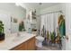 Stylish bathroom with a vanity, decorative shelf, and a shower curtain with cactus design at 1924 S Rome St, Gilbert, AZ 85295