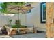 A charming raised bed is featured in the outdoor garden space at 1924 S Rome St, Gilbert, AZ 85295