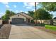 Charming single-story home featuring a well-maintained yard and attached two-car garage at 1924 S Rome St, Gilbert, AZ 85295