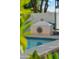 A sun-shaped carving decorates the pool-side wood-burning fire feature at 1924 S Rome St, Gilbert, AZ 85295