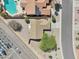 Aerial view of property showcasing pool, patio, and neighborhood layout at 20149 N 92Nd Ave, Peoria, AZ 85382