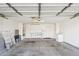 Spacious garage with ample storage, shelving, and room for vehicles at 20149 N 92Nd Ave, Peoria, AZ 85382