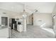 Open concept home with stainless steel appliances, granite countertops, recessed lighting, and vaulted ceilings at 20149 N 92Nd Ave, Peoria, AZ 85382