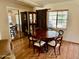 Formal dining room with a wood table, matching chairs, and a built-in cabinet at 2537 E Hazelwood St, Phoenix, AZ 85016