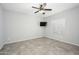 Empty bedroom with tile floors, a ceiling fan and natural lighting at 25951 W Piute Ave, Buckeye, AZ 85396