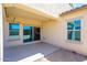 Covered patio with sliding glass door, perfect for outdoor entertaining or relaxation at 25951 W Piute Ave, Buckeye, AZ 85396