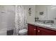 Well-lit bathroom featuring a shower-tub combination and granite countertop vanity, complemented with decor at 30388 N Opal Dr, San Tan Valley, AZ 85143