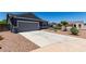 Lovely single-story home offering a two-car garage and low-maintenance desert landscaping for easy living at 30388 N Opal Dr, San Tan Valley, AZ 85143
