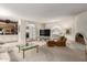 Open-concept living area with fireplace, television, and easy access to the kitchen at 3131 E Las Rocas Dr, Phoenix, AZ 85028