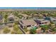Beautiful home with backyard pool and patio area surrounded by desert landscape at 3331 N Acacia Way, Buckeye, AZ 85396