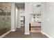 Bathroom leading to bedroom, closet, and walk-in shower at 3331 N Acacia Way, Buckeye, AZ 85396