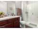 Modern bathroom with glass enclosed shower and sink at 3331 N Acacia Way, Buckeye, AZ 85396