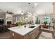 Kitchen and dining area boast an open concept and modern finishes at 3331 N Acacia Way, Buckeye, AZ 85396