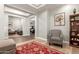 Cozy sitting area in a neutral color palette, and wood floors that flow to the living spaces at 3331 N Acacia Way, Buckeye, AZ 85396