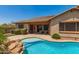 Inviting backyard pool and patio area perfect for entertaining at 3331 N Acacia Way, Buckeye, AZ 85396