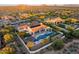 An elevated aerial view showing the pool, outdoor seating, and well manicured yard at 35556 N 87Th Pl, Scottsdale, AZ 85266