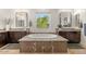Luxurious bathroom featuring a large soaking tub, granite countertops, and dual vanities at 35556 N 87Th Pl, Scottsdale, AZ 85266