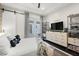 Modern bedroom featuring a sliding barn door, white accents, and fun décor at 35556 N 87Th Pl, Scottsdale, AZ 85266