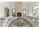 The spacious living room includes comfortable seating, a cozy fireplace, and stylish decor at 35556 N 87Th Pl, Scottsdale, AZ 85266