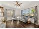 Spacious living room with hardwood floors, neutral colors, and desert landscaping at 35556 N 87Th Pl, Scottsdale, AZ 85266