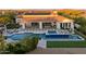 Entertain guest with the refreshing pool and spa, complimented by a outdoor fire pit, and green area at 35556 N 87Th Pl, Scottsdale, AZ 85266