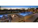 Inviting backyard oasis featuring a pool, spa, fire pit and lounge area for relaxing and entertaining at 35556 N 87Th Pl, Scottsdale, AZ 85266