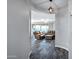 Open-concept living room features wood-look tile flooring and neutral paint at 3890 E Perkinsville St, Gilbert, AZ 85295