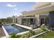 Stunning backyard with a pool, lounge area, and modern architectural design, perfect for outdoor living at 4451 E Joshua Tree Ln, Paradise Valley, AZ 85253