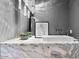 Bathroom boasts marble countertops, modern fixtures, and decorative accents at 4451 E Joshua Tree Ln, Paradise Valley, AZ 85253