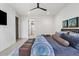 Comfortable bedroom offers modern decor and a ceiling fan, creating a relaxing atmosphere at 4451 E Joshua Tree Ln, Paradise Valley, AZ 85253