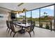 Well-appointed dining area with mountain views and a modern light fixture at 4451 E Joshua Tree Ln, Paradise Valley, AZ 85253
