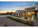 Luxurious modern home featuring a sparkling pool, expansive patio, and beautifully landscaped grounds at 4451 E Joshua Tree Ln, Paradise Valley, AZ 85253
