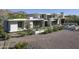 Stunning modern home with clean lines, desert landscaping, and mountain views at 4451 E Joshua Tree Ln, Paradise Valley, AZ 85253