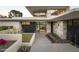 Modern home with manicured desert landscaping and contemporary architectural details at the front entrance at 4451 E Joshua Tree Ln, Paradise Valley, AZ 85253