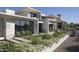 Stunning modern home showcasing meticulous landscaping and sleek architectural design elements at 4451 E Joshua Tree Ln, Paradise Valley, AZ 85253