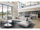 Bright, open living space featuring high ceilings, and stylish modern furnishings at 4451 E Joshua Tree Ln, Paradise Valley, AZ 85253
