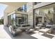 Inviting outdoor patio featuring stylish seating areas and views of the main house at 4451 E Joshua Tree Ln, Paradise Valley, AZ 85253