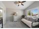Cozy bedroom with vaulted ceilings, bright windows with shutters and comfortable daybed at 4569 E Lariat Ln, Phoenix, AZ 85050