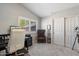 Inviting bedroom featuring vaulted ceiling, window with shutters, and closet with sliding doors at 4569 E Lariat Ln, Phoenix, AZ 85050