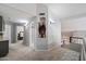 Light and airy hallway with modern décor, high ceilings, and natural lighting at 4569 E Lariat Ln, Phoenix, AZ 85050