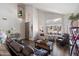 Bright living room with high ceilings, modern furniture, and lots of natural light at 4569 E Lariat Ln, Phoenix, AZ 85050