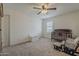 Neutral bedroom featuring a ceiling fan, carpet, and crib at 4607 S Venus --, Mesa, AZ 85212