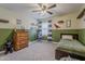 Cheerful bedroom features an accent wall and cozy decor, ideal for a personal space at 4607 S Venus --, Mesa, AZ 85212
