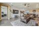 Open living room, with access to the dining area, kitchen, and bedroom at 4607 S Venus --, Mesa, AZ 85212