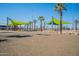 Fun playground with shade sails and modern play structures, perfect for of all ages at 4607 S Venus --, Mesa, AZ 85212