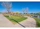 Beautiful pond view with walking path, perfect for a relaxing stroll in the community at 4607 S Venus --, Mesa, AZ 85212