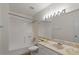 A bathroom with a shower, a toilet, and a marble sink counter top at 540 N May -- # 2148, Mesa, AZ 85201