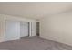 This is a bedroom with carpet and a closet at 540 N May -- # 2148, Mesa, AZ 85201