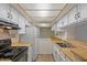 Kitchen featuring white cabinets and laminate countertops at 540 N May -- # 2148, Mesa, AZ 85201